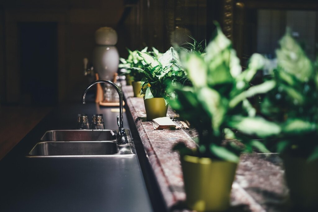 baking soda poured into kitchen sink drain