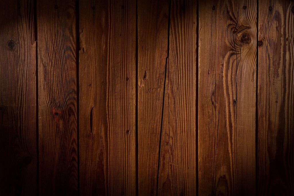 waterproof paint application on wooden cabinet board inside kitchen