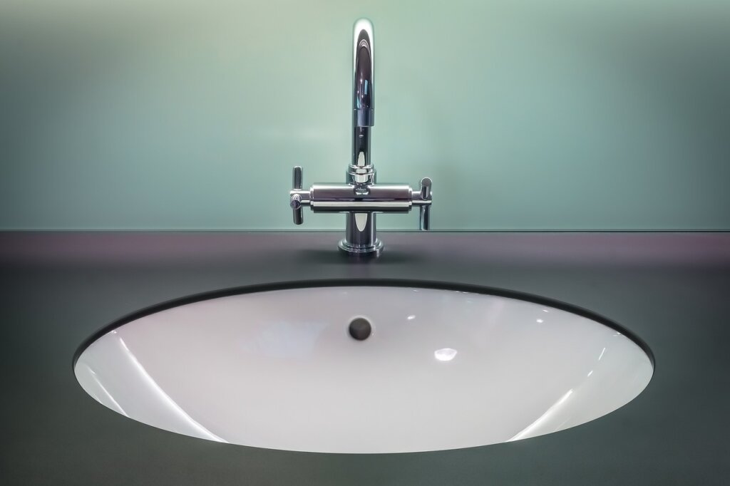 stainless steel knife stored wet on sink edge