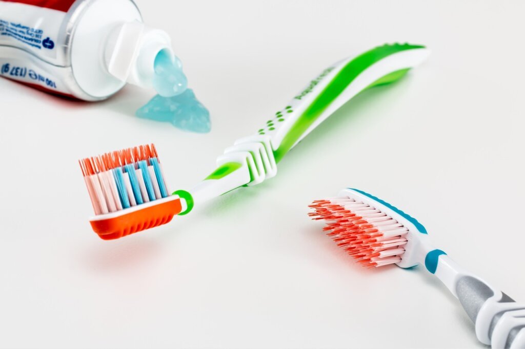 baking soda paste on white sneaker with toothbrush