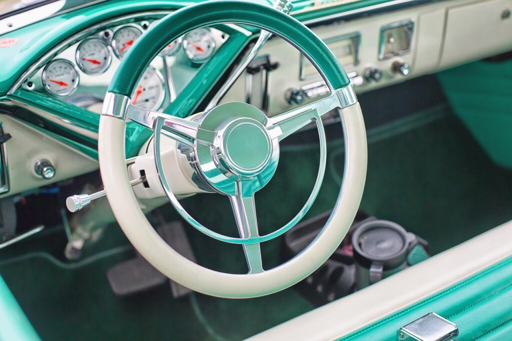 sunlit car dashboard with mask placed on it, warning scene, interior photo
