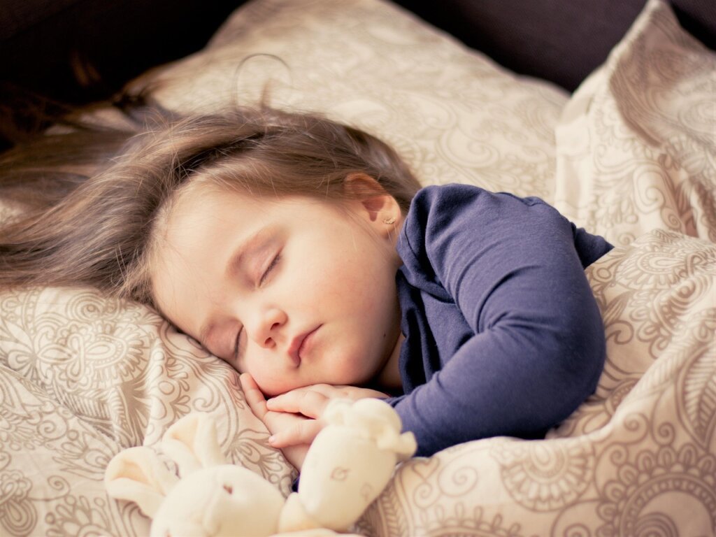 mosquito flying near sleeping baby at night
