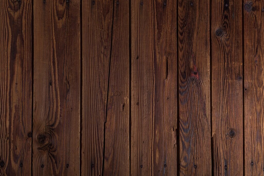 sandpaper smoothing wooden drawer side panel