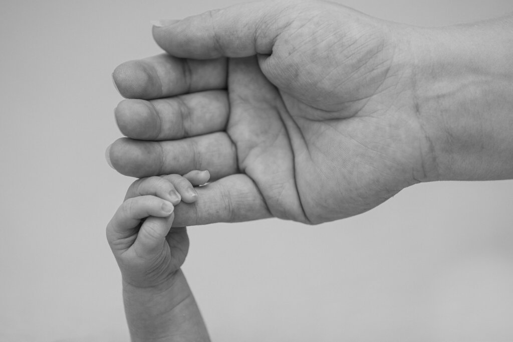 mother with newborn in postpartum care center