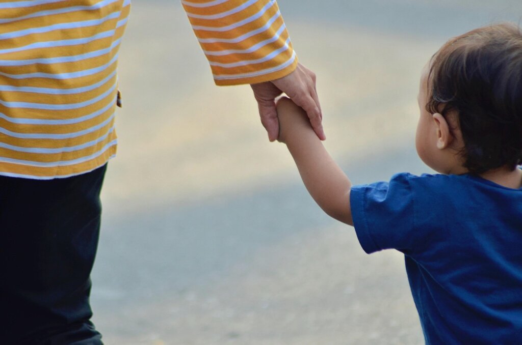 young single mother with infant at Korean community center