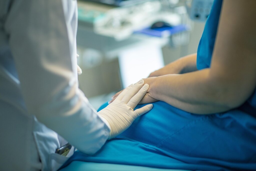 elderly patient receiving medical care at Korean clinic