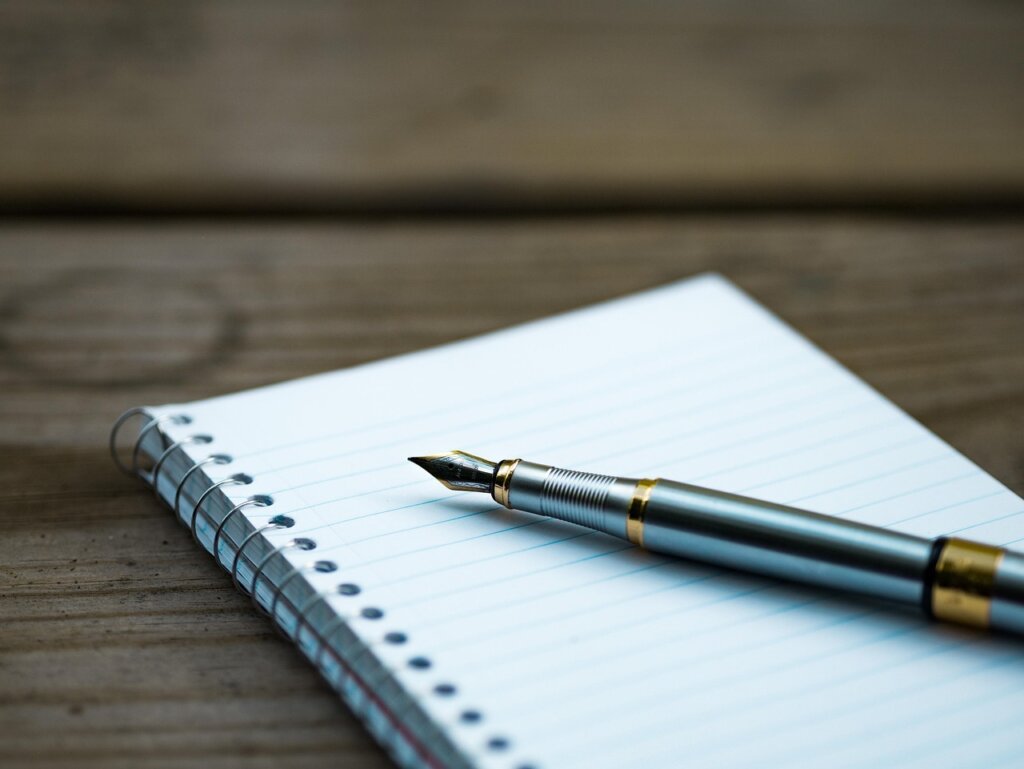 Close-up of Korean government application form with pen on table