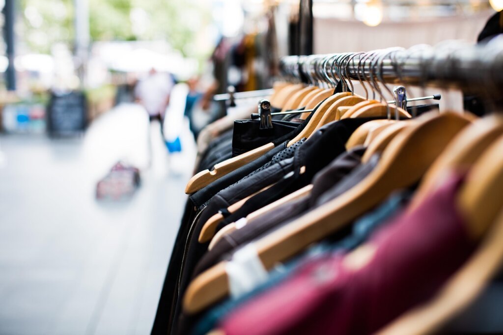 loan officer visiting small retail shop for site inspection